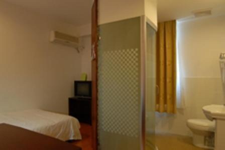 Jingyue 99 Inn Town Shop Shanghai Room photo